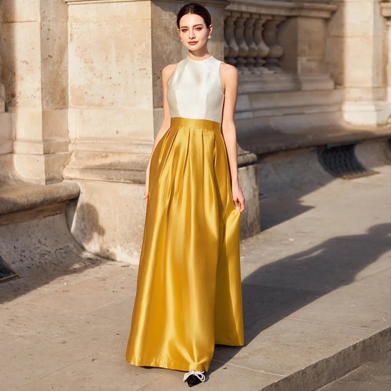 Elegant Gold and Ivory Satin Evening Gown with Halter Neckline Elegant Gold and Ivory Satin Evening Gown with Halter Neckline