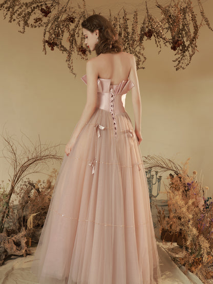 Elegant Blush Pink Strapless Tulle Ball Gown with Bow Accents - Harmony Gallery