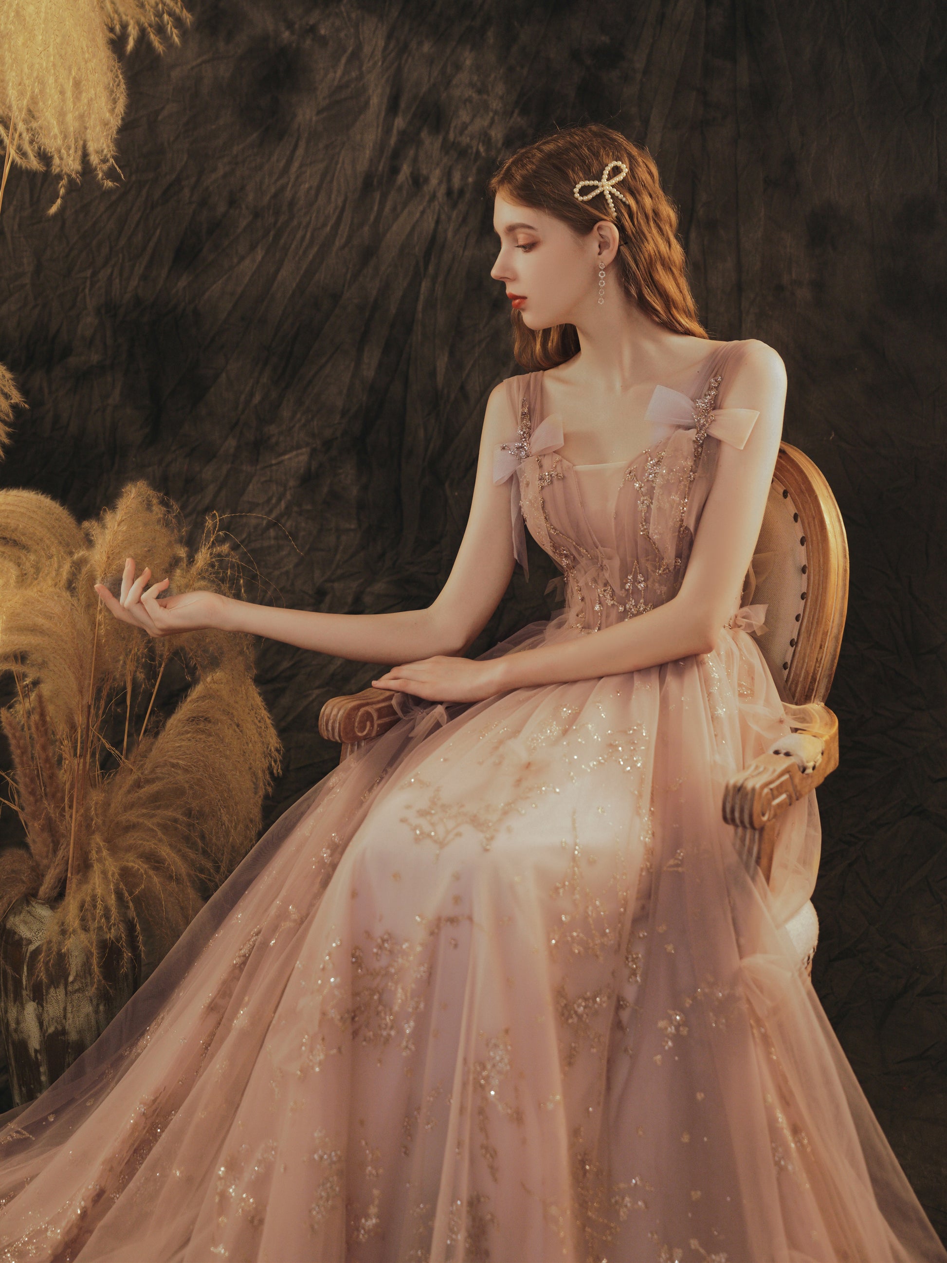 Elegant Rose Gold Glitter Tulle Evening Gown with Bow Accents Elegant Rose Gold Glitter Tulle Evening Gown with Bow Accents