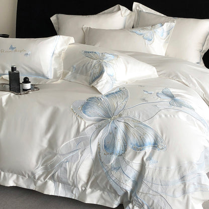 Set da letto in quattro pezzi in cotone leggero di lusso con squisite farfalle ricamate