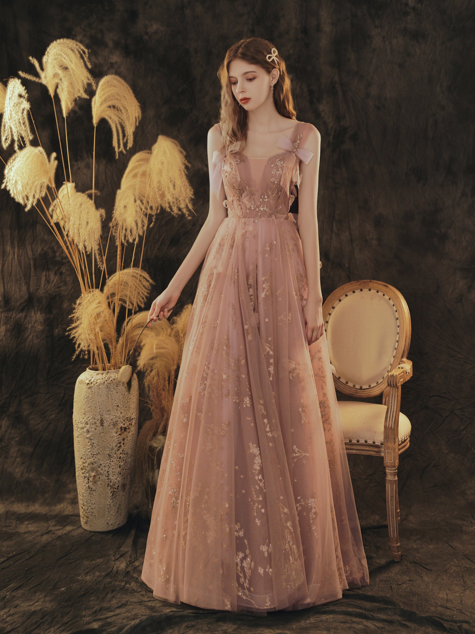 Elegant Rose Gold Glitter Tulle Evening Gown with Bow Accents Elegant Rose Gold Glitter Tulle Evening Gown with Bow Accents