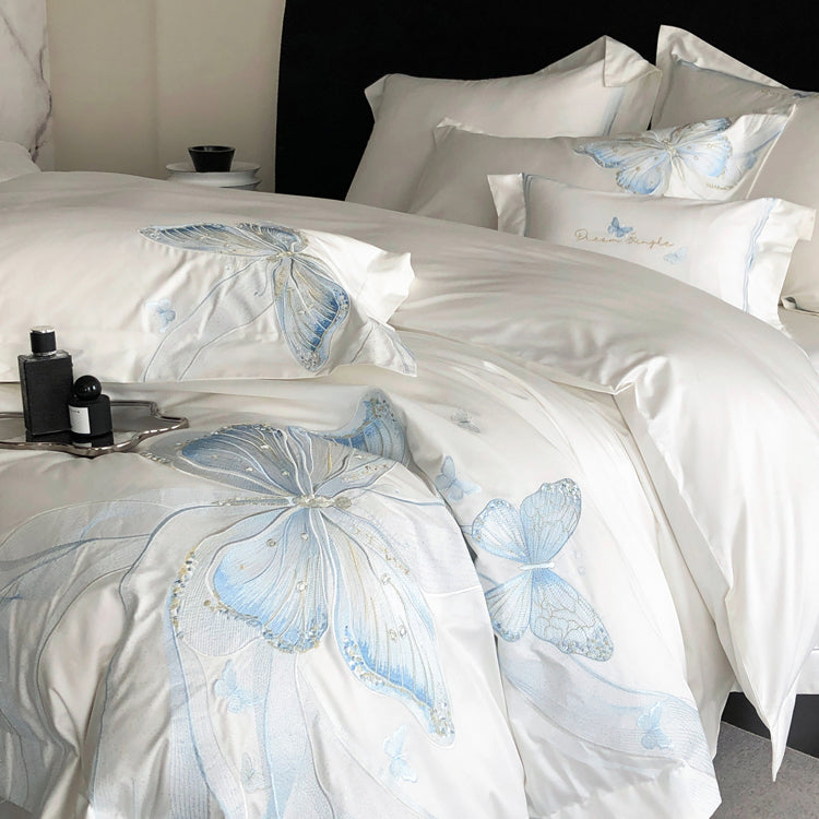 Set da letto in quattro pezzi in cotone leggero di lusso con squisite farfalle ricamate