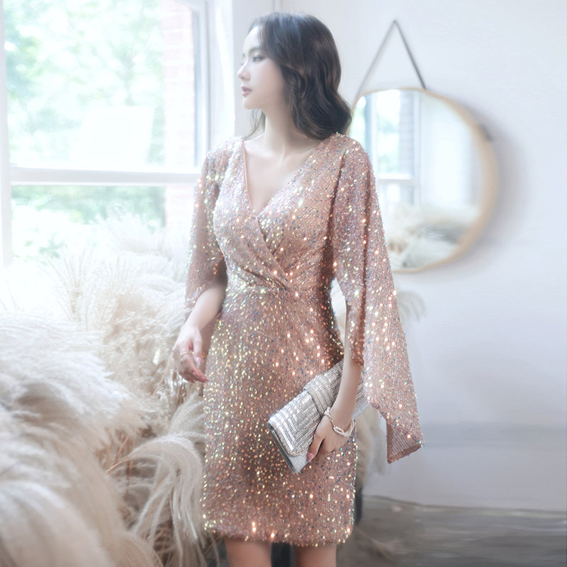 Stunning Rose Gold Sequin Mini Dress with Dramatic Cape Sleeves Stunning Rose Gold Sequin Mini Dress with Dramatic Cape Sleeves