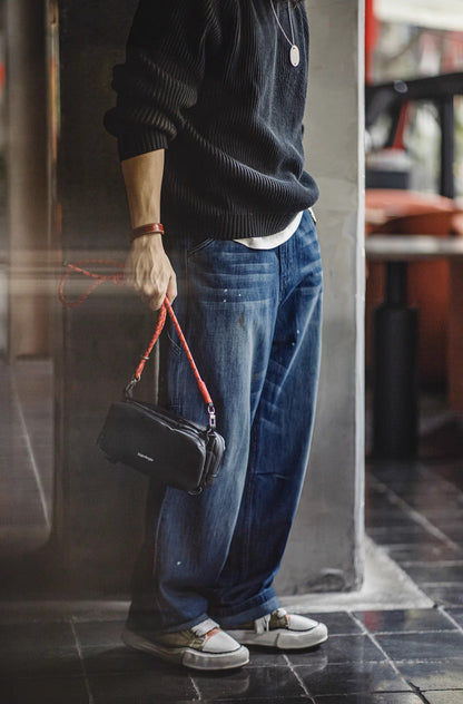 Jeans masculino americano desgastado com bigode de gato branco lavado com respingos de tinta