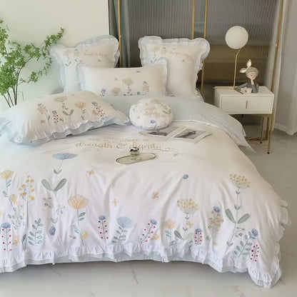 Conjunto de cama bordado de flores de quatro peças de algodão lavado com renda fada